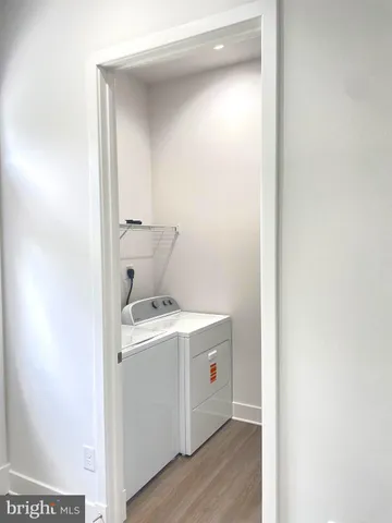 a picture of a room with a white wall and white walls