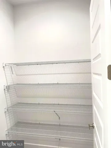 a view of small space with racks on the wall