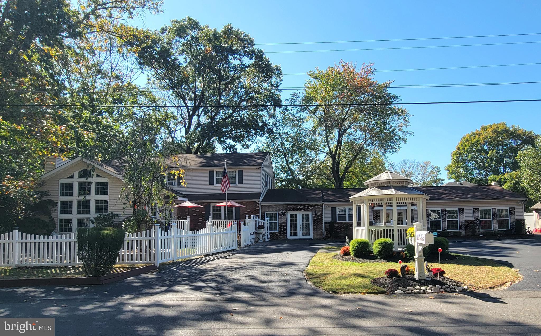 a front view of a house with swimming pool