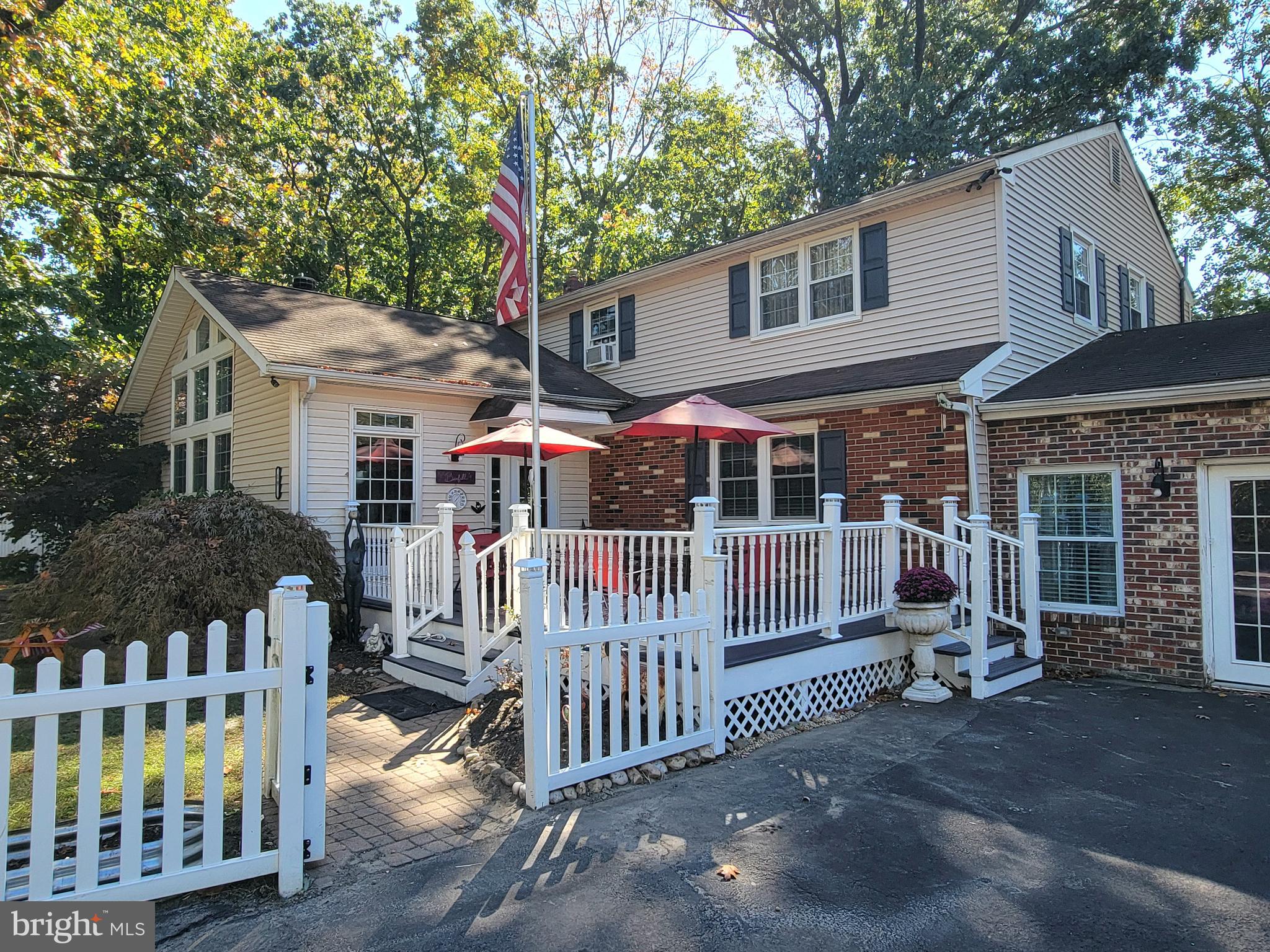 111 McKee Road Gibbsboro, NJ 08026 - Photo 2 of 62 a view of house with a porch and furniture