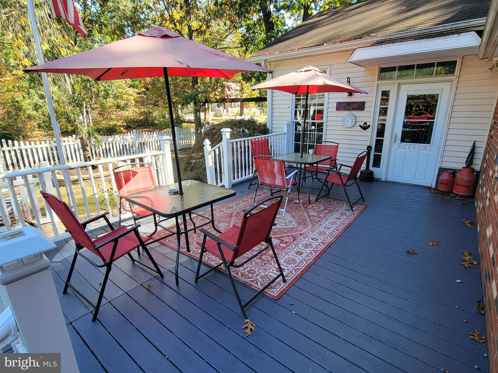 111 McKee Road Gibbsboro, NJ 08026 - Photo 3 of 62 a view of a chairs and table in patio with a wooden deck