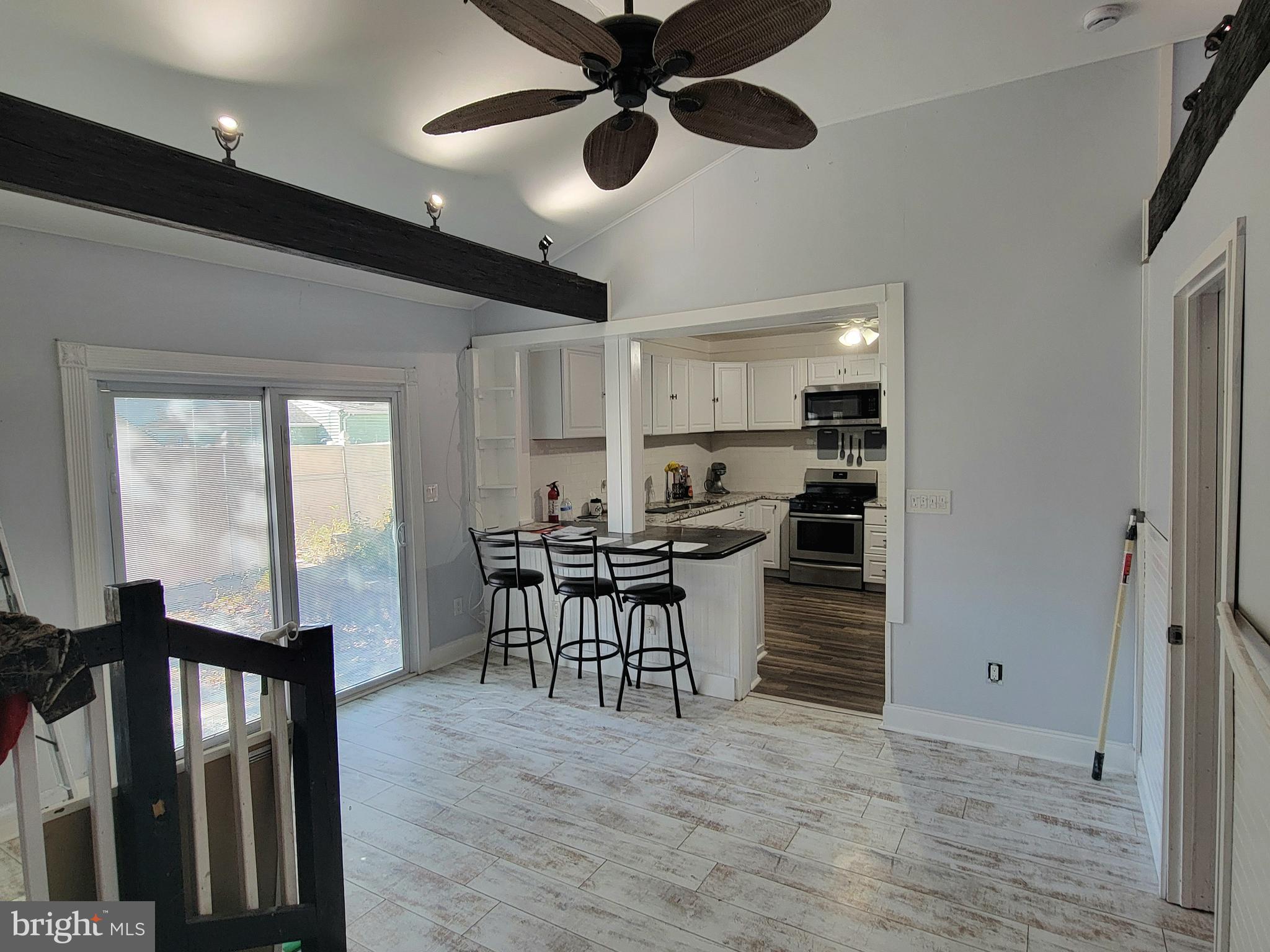 111 McKee Road Gibbsboro, NJ 08026 - Photo 47 of 62 a view of a dining room with furniture window and wooden floor