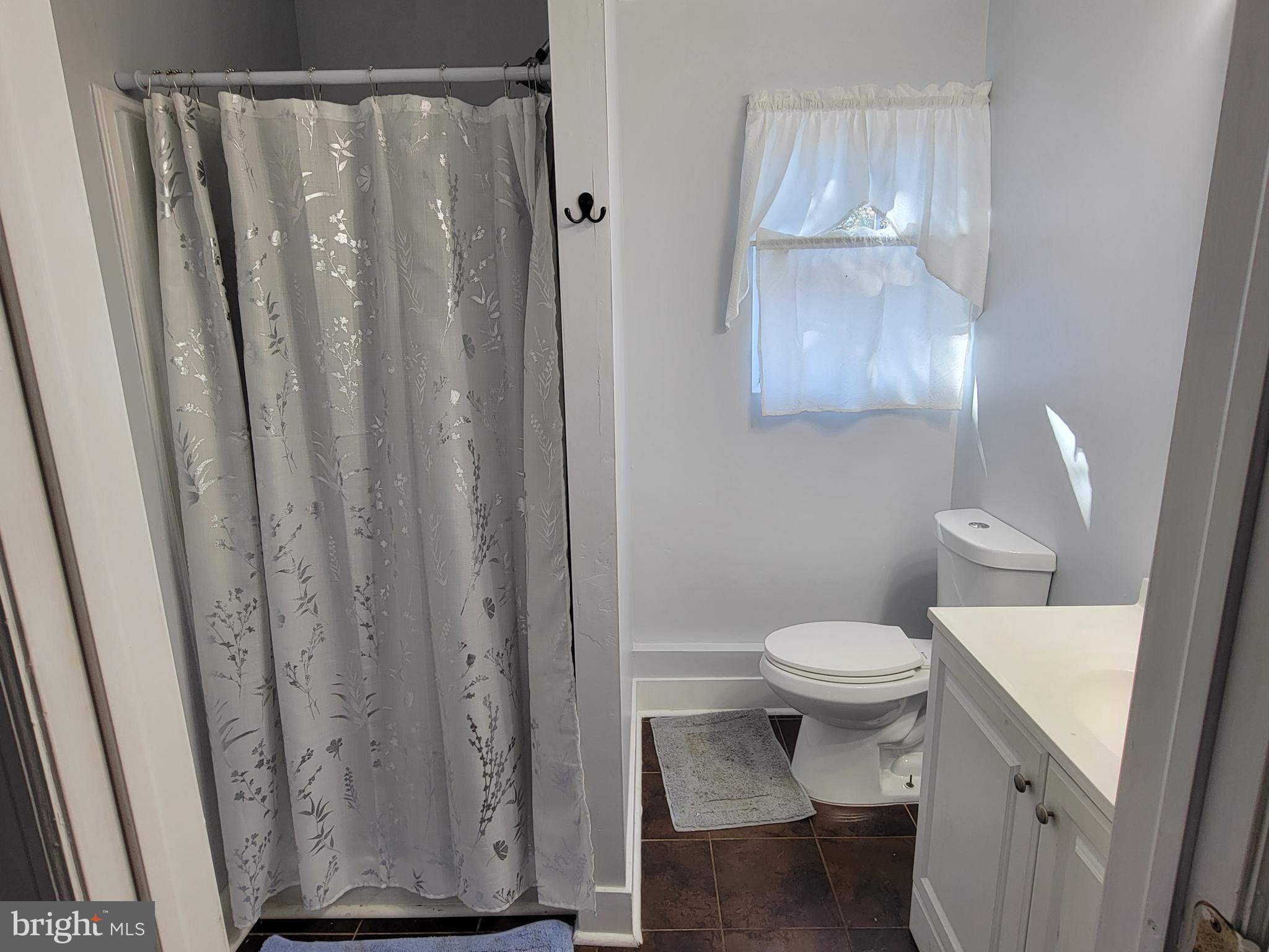 111 McKee Road Gibbsboro, NJ 08026 - Photo 54 of 62 a bathroom with a toilet a sink and a shower
