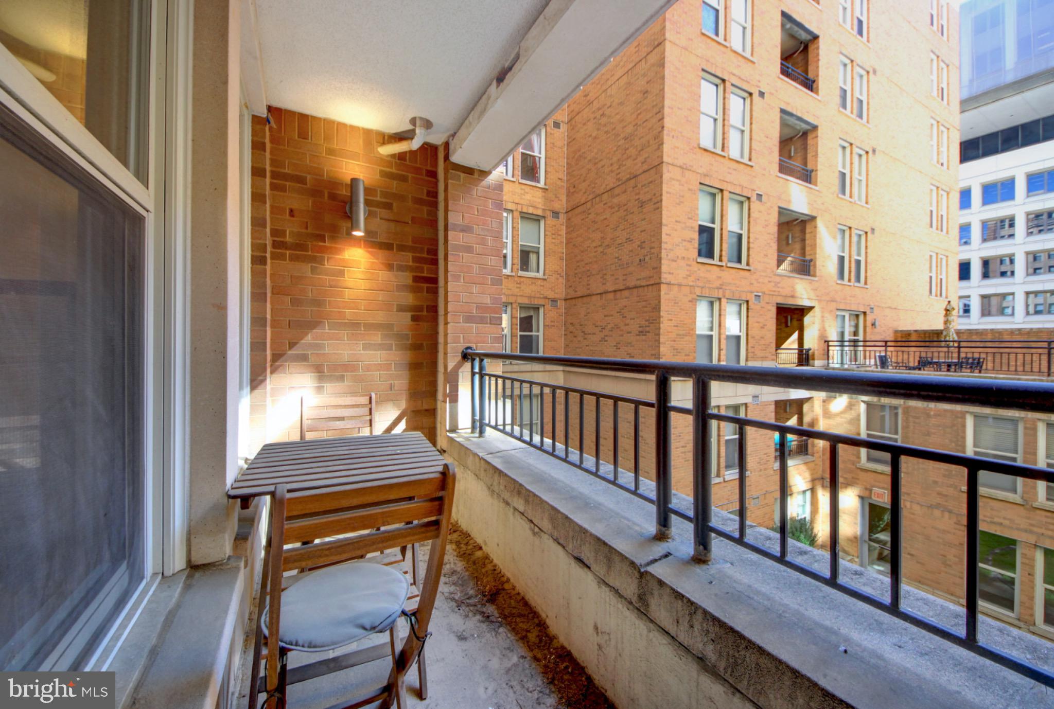 915 E Street Northwest, Unit 505 Washington, DC 20004 - Photo 12 of 35 Charming private balcony with urban views