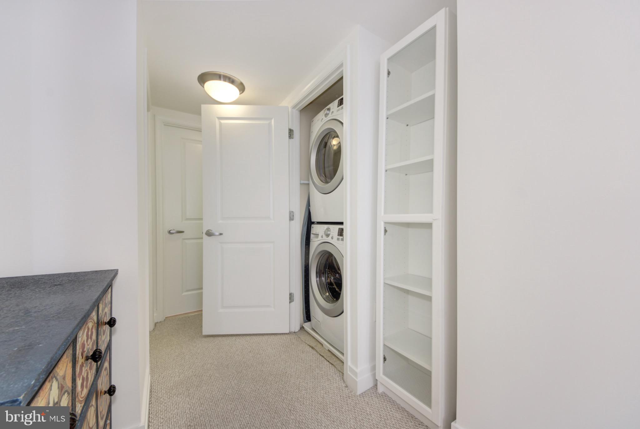 915 E Street Northwest, Unit 505 Washington, DC 20004 - Photo 15 of 35 In-unit laundry located within bedroom suite