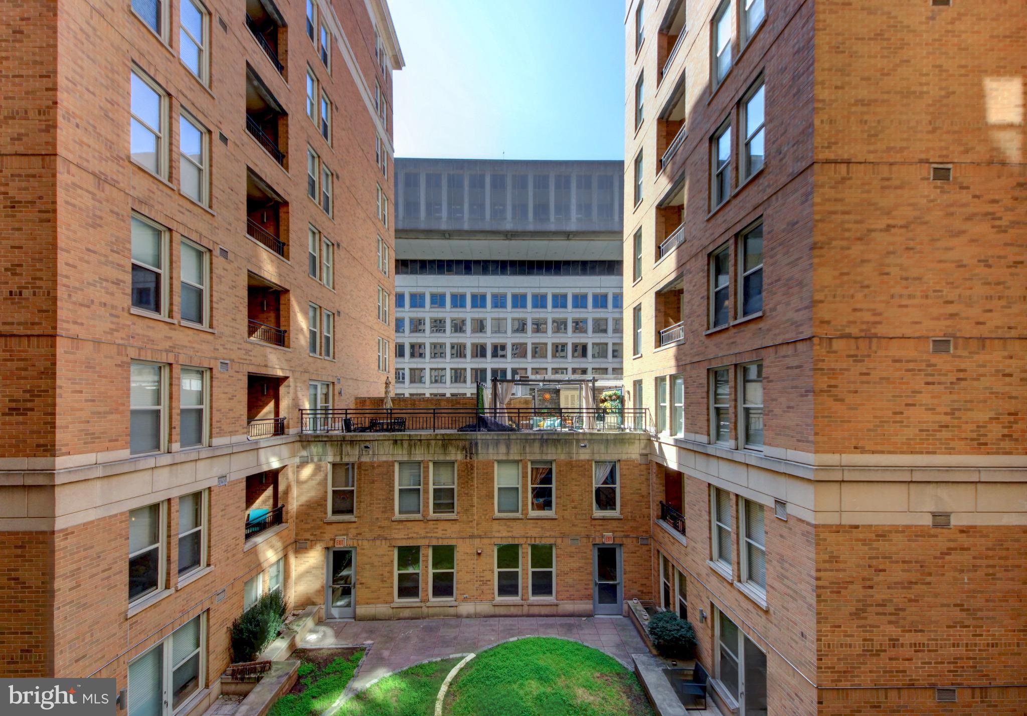 915 E Street Northwest, Unit 505 Washington, DC 20004 - Photo 22 of 35 Urban oasis nestled between brick facades.