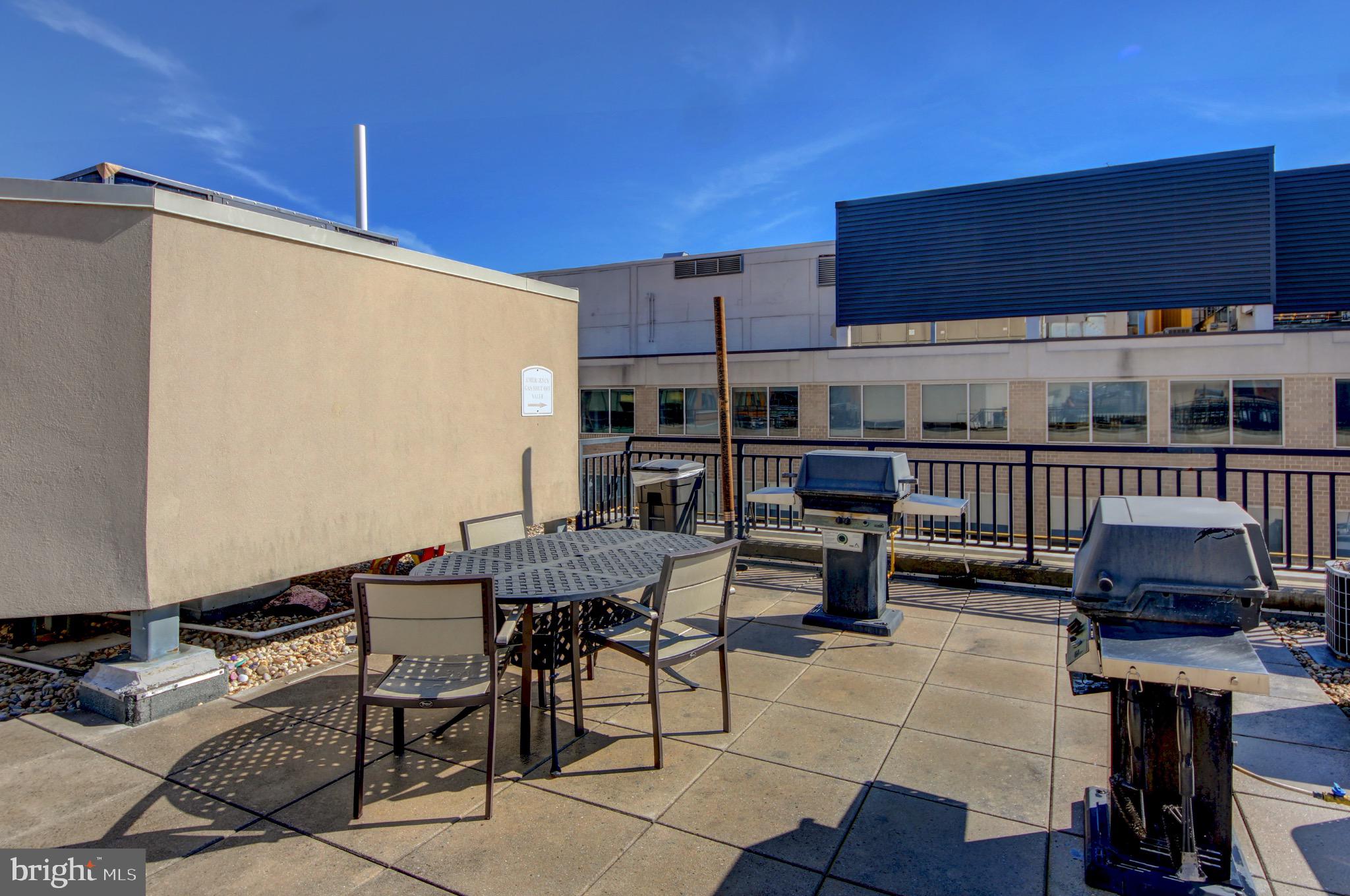 915 E Street Northwest, Unit 505 Washington, DC 20004 - Photo 23 of 35 Shared rooftop terrace with grilling area