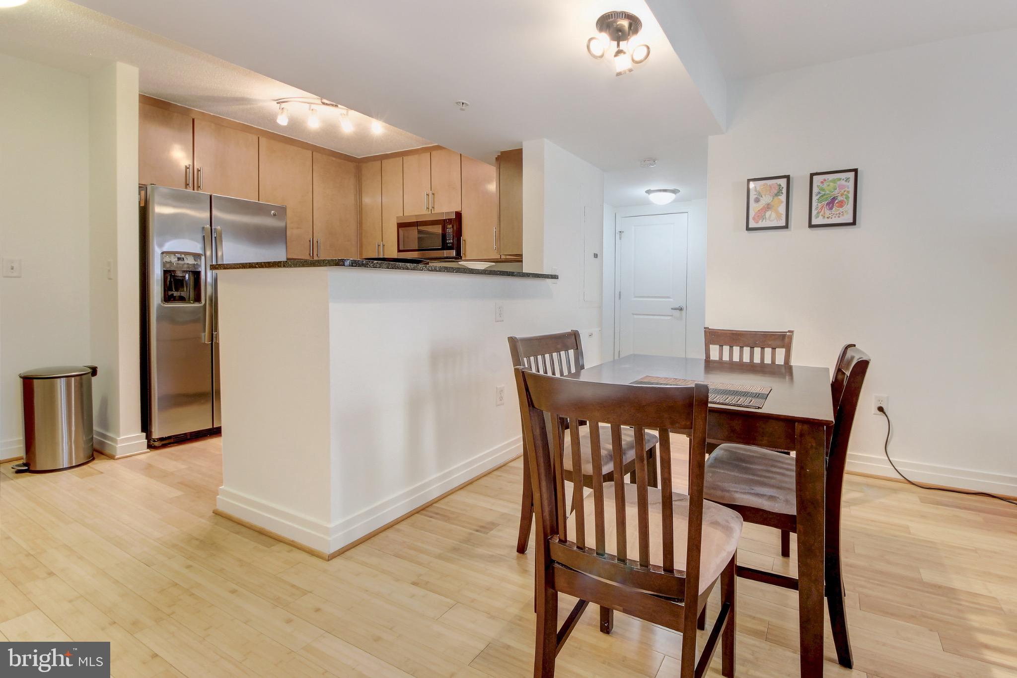 915 E Street Northwest, Unit 505 Washington, DC 20004 - Photo 6 of 35 Kitchen peninsula ideal for entertaining