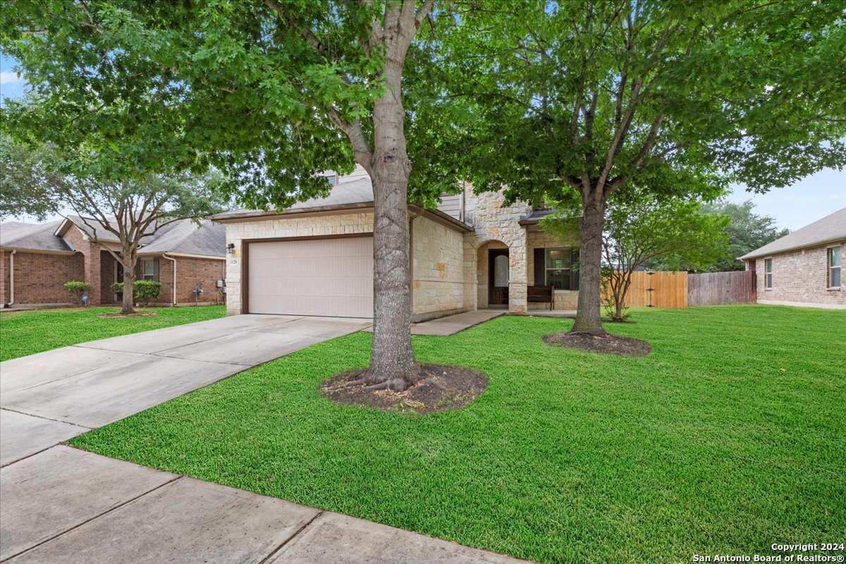 3128 Muntjac Schertz, TX 78154 - Photo 1 of 1 a house that is sitting in the grass