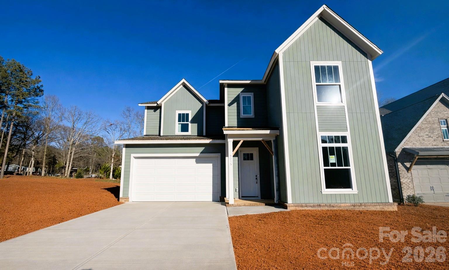 5015 Holw Br Road Charlotte, NC 28278 - Photo 7 of 7 a front view of a house with a yard