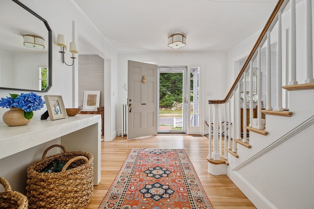 5 Weston Road Hingham, MA 02043 - Photo 1 of 1 a room with lots of white furniture and a rug
