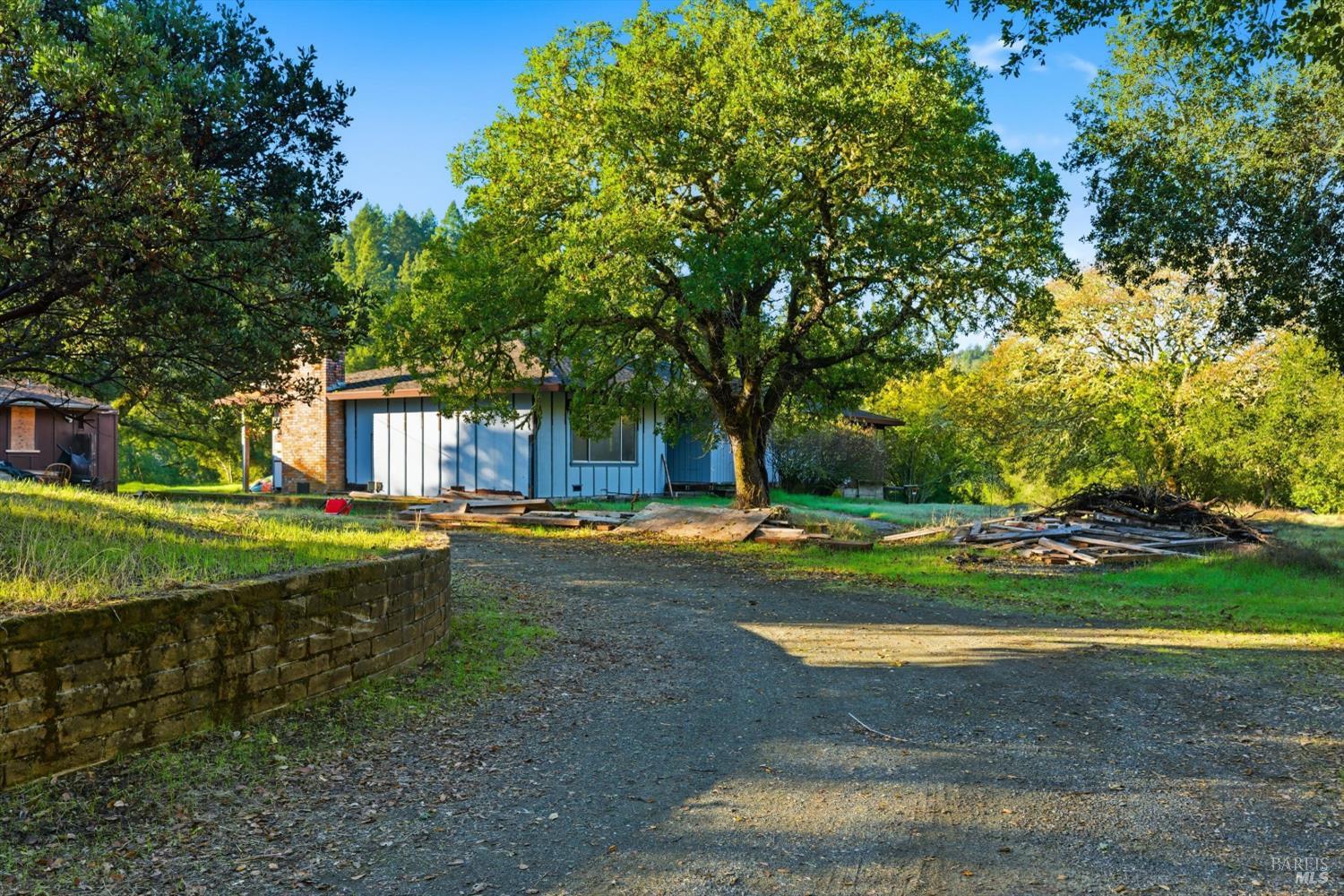 5140 Sharp Road Calistoga, CA 94515 - Photo 28 of 28 a view of a house with swimming pool and a yard