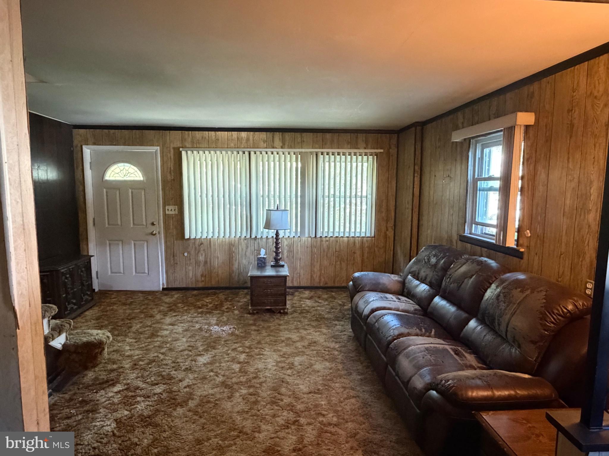 821 Beech Road Wallingford, PA 19086 - Photo 3 of 20 Cozy living space with warm tones.