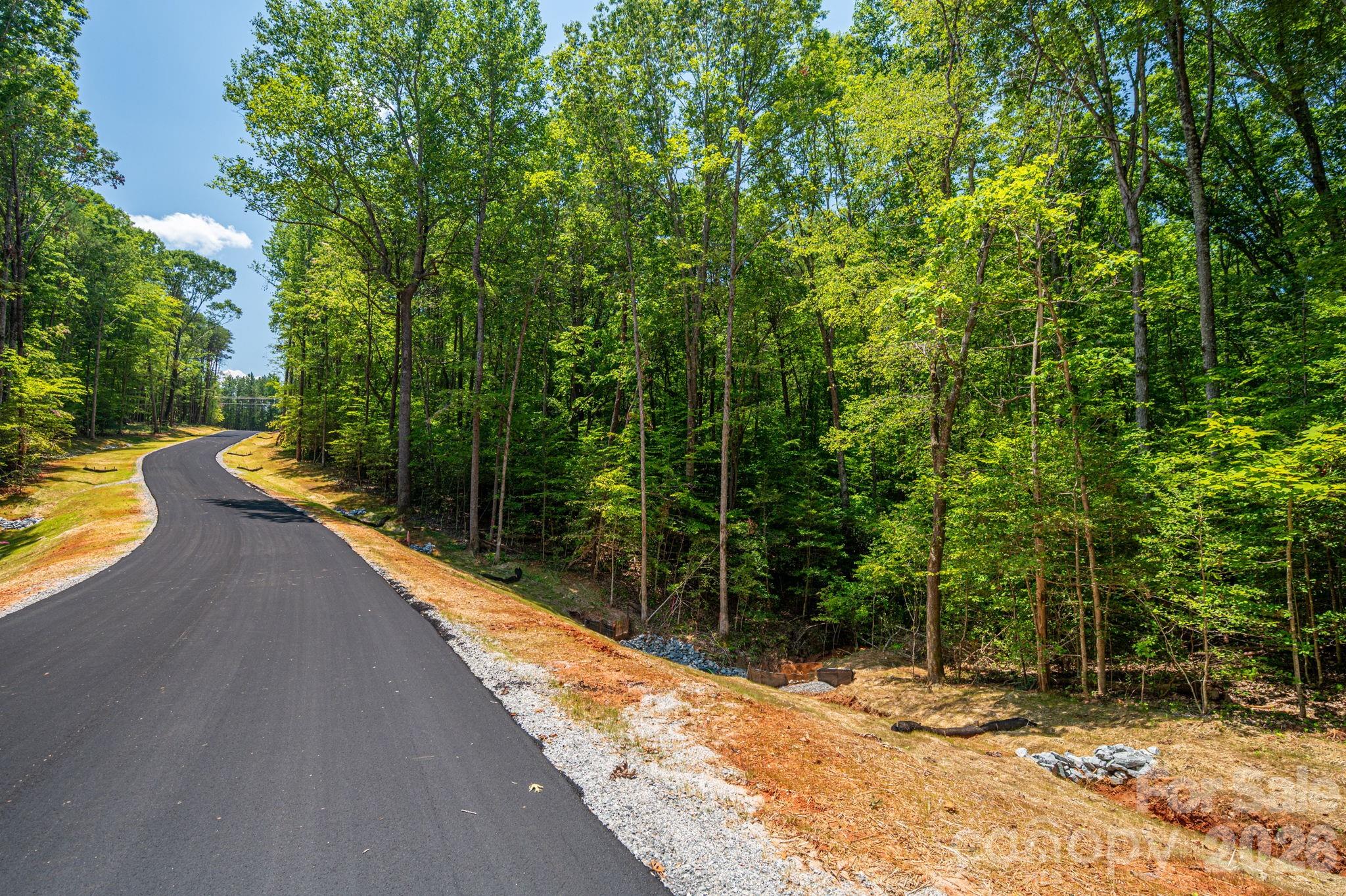0 Oak Hill, Unit 13B Denver, NC 28037 - Photo 8 of 14 a view of swimming pool with a patio