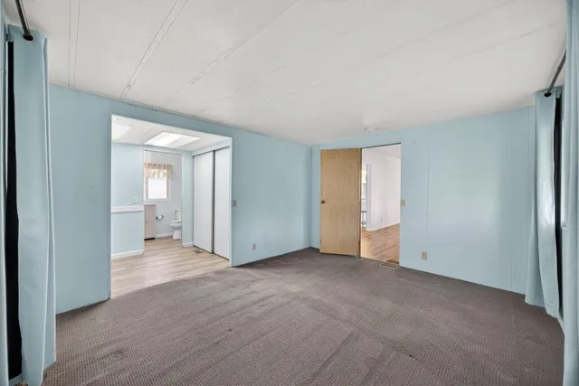 a bathroom with 2 sink and a mirror