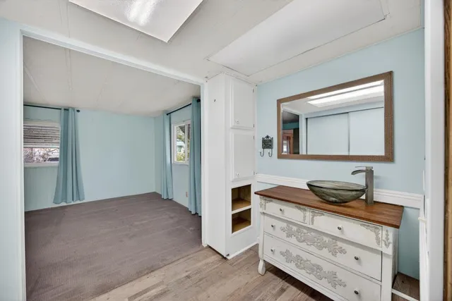 a view of a room with rack on the wall