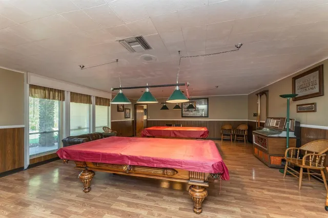 an aerial view of waterside residential houses with outdoor space