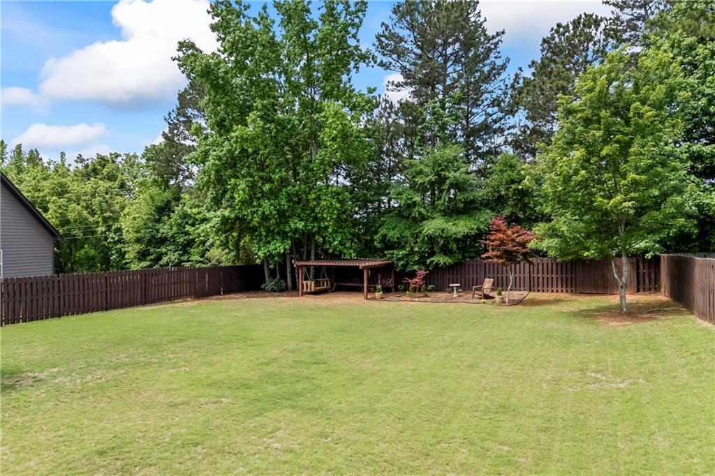 42 Pintail Lane Jefferson, GA 30549 - Photo 28 of 42 a swimming pool with trees in the background