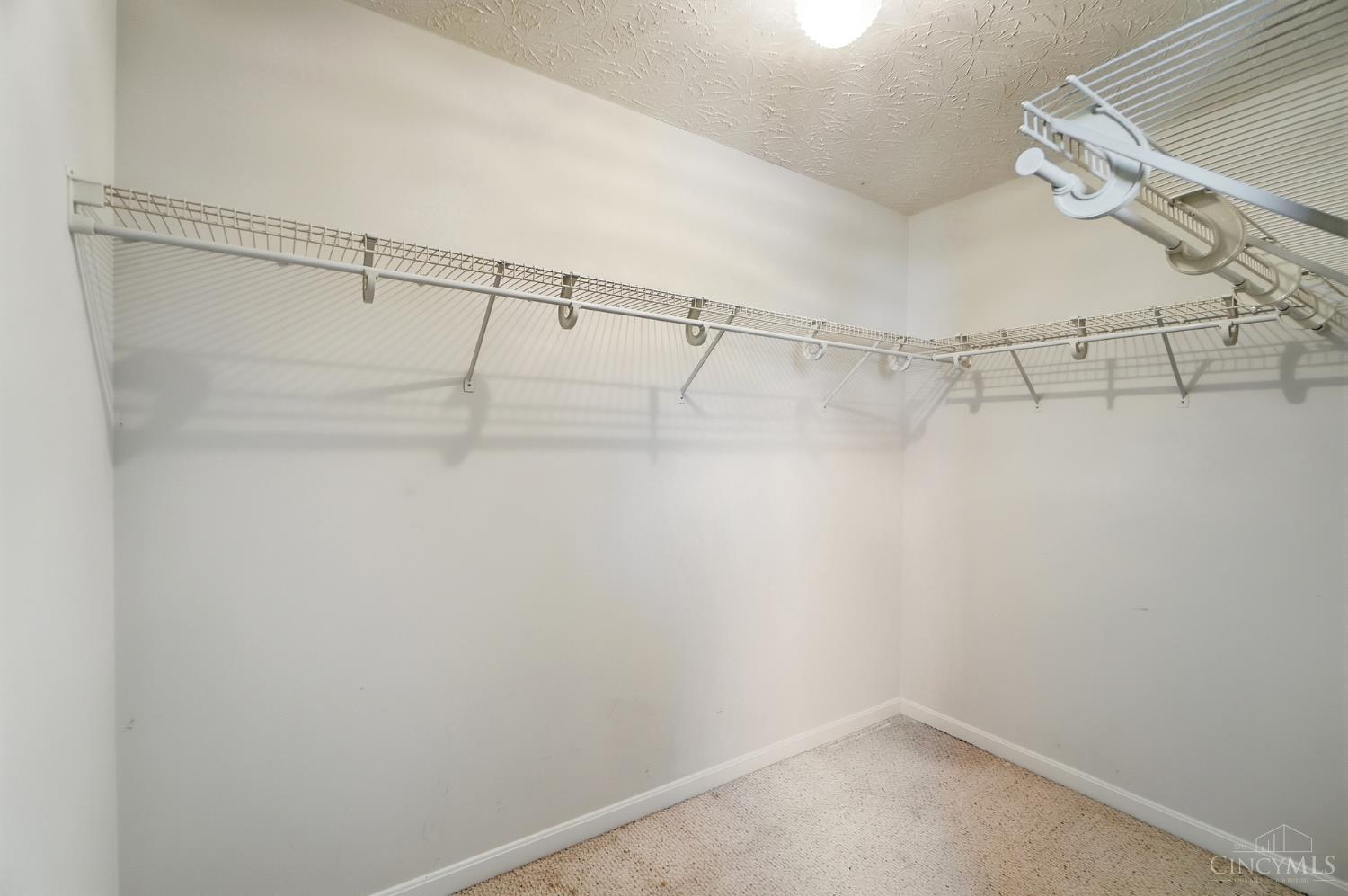 9865 Seward Road Fairfield, OH 45014 - Photo 19 of 43 Primary bedroom walk-in closet.