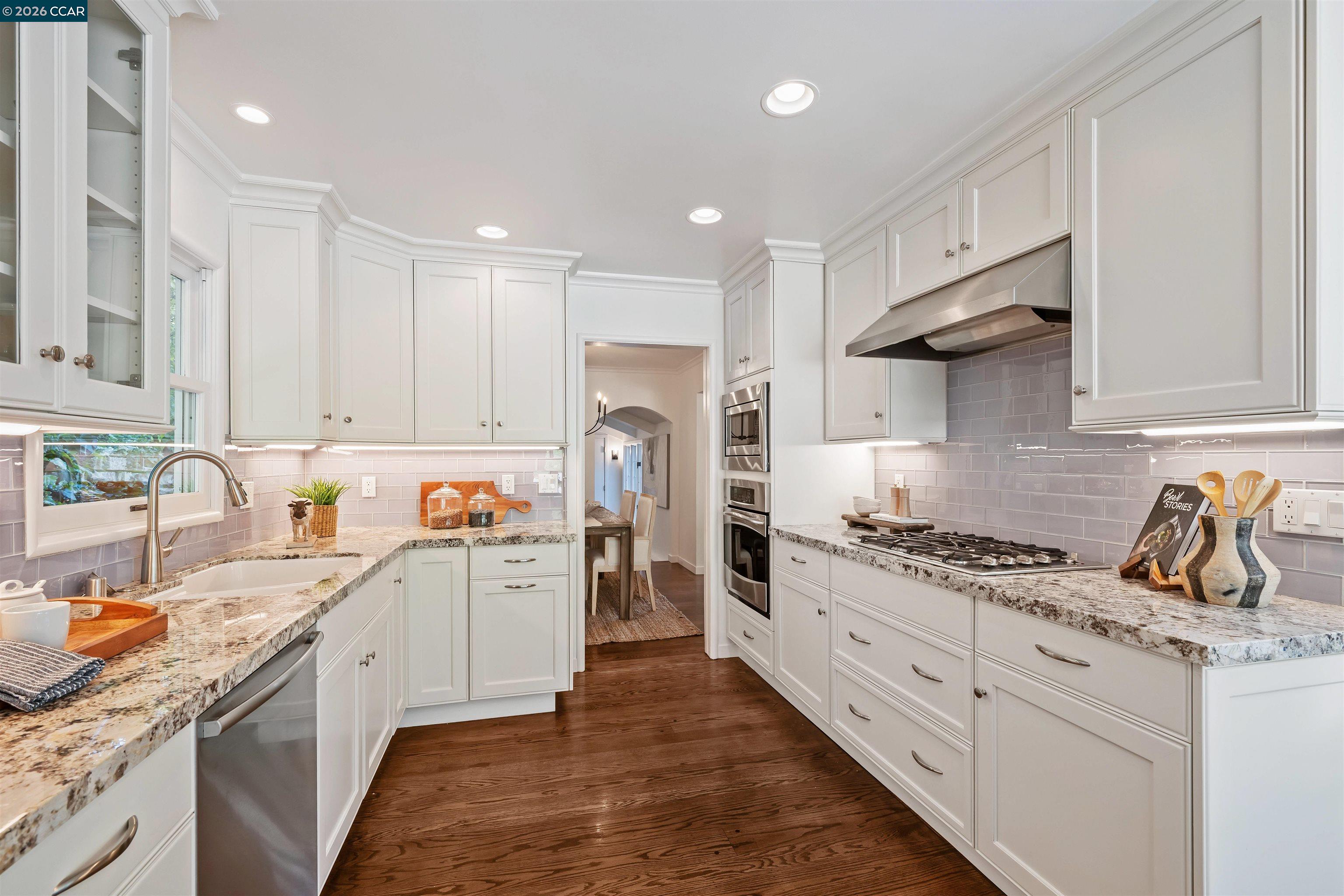120 Las Vegas Road Orinda, CA 94563 - Photo 5 of 23 a kitchen with stainless steel appliances granite countertop a sink stove refrigerator and cabinets