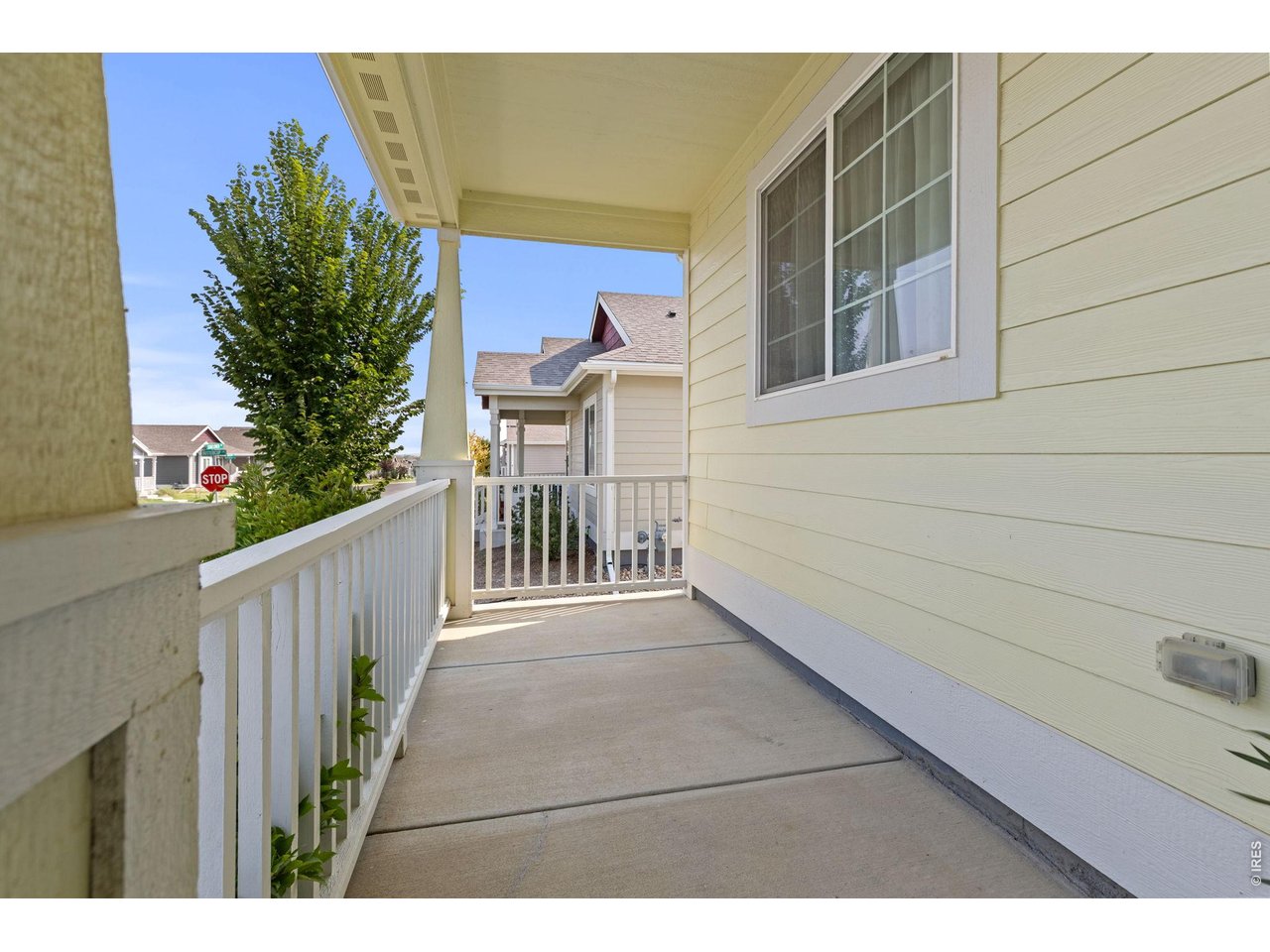 4231 Sunflower Road Evans, CO 80620 - Photo 29 of 29 Great covered front porch provides some privacy & peaceful setting