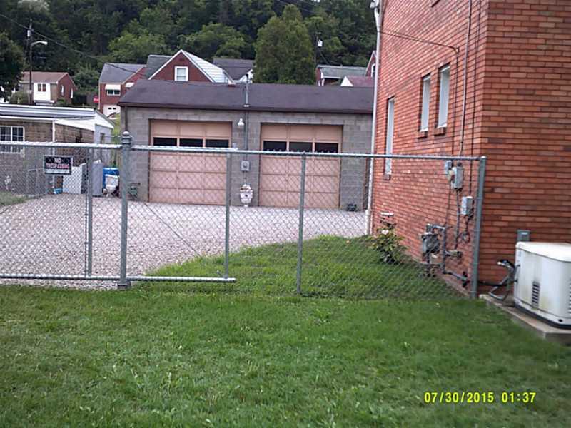 822 Bower Hill Road Bridgeville, PA 15017 - Photo 22 of 24 Other. Side yard and Enclosed Gate to parking and garage. Rolling Gate