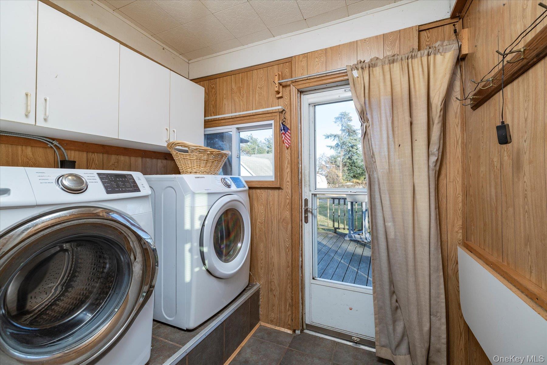2483 Central Avenue Baldwin, NY 11510 - Photo 17 of 28 a utility room with dryer and washer