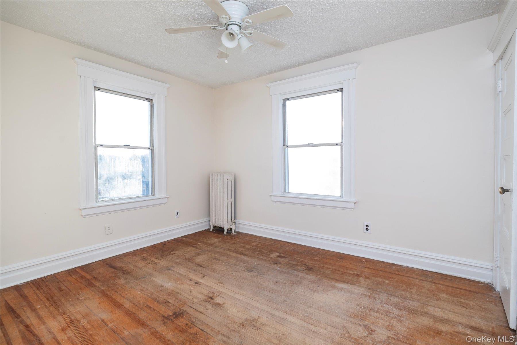2483 Central Avenue Baldwin, NY 11510 - Photo 18 of 28 a view of an empty room with a window