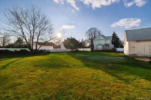 a view of a house with a big yard