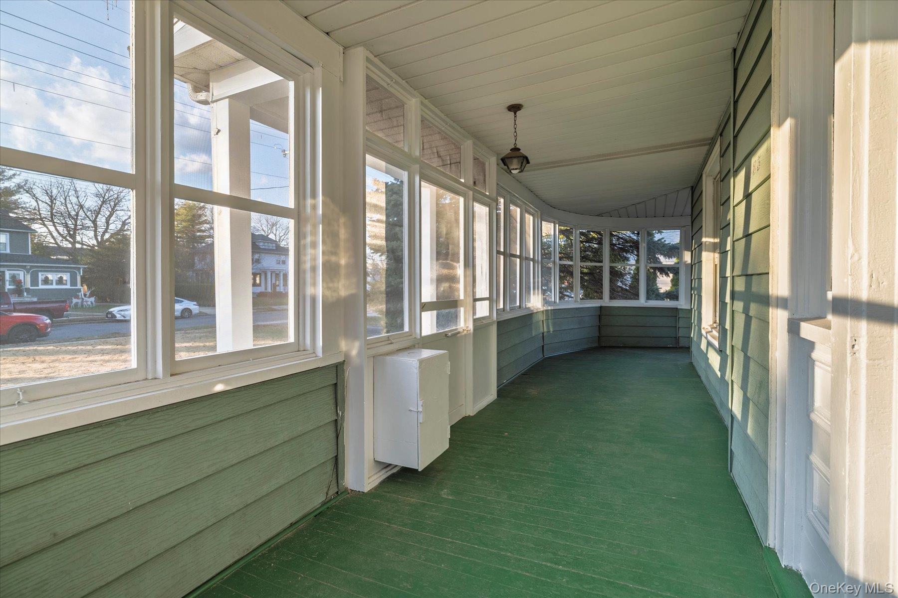 2483 Central Avenue Baldwin, NY 11510 - Photo 6 of 28 a view of a kitchen with refrigerator and windows