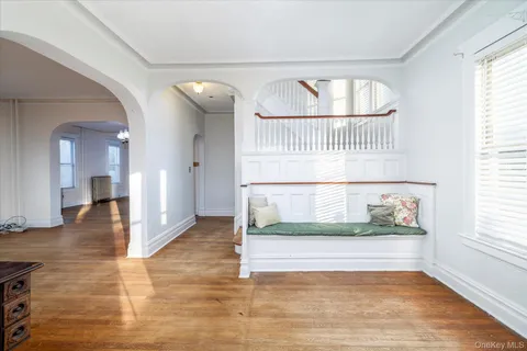 a view of entryway with wooden floor