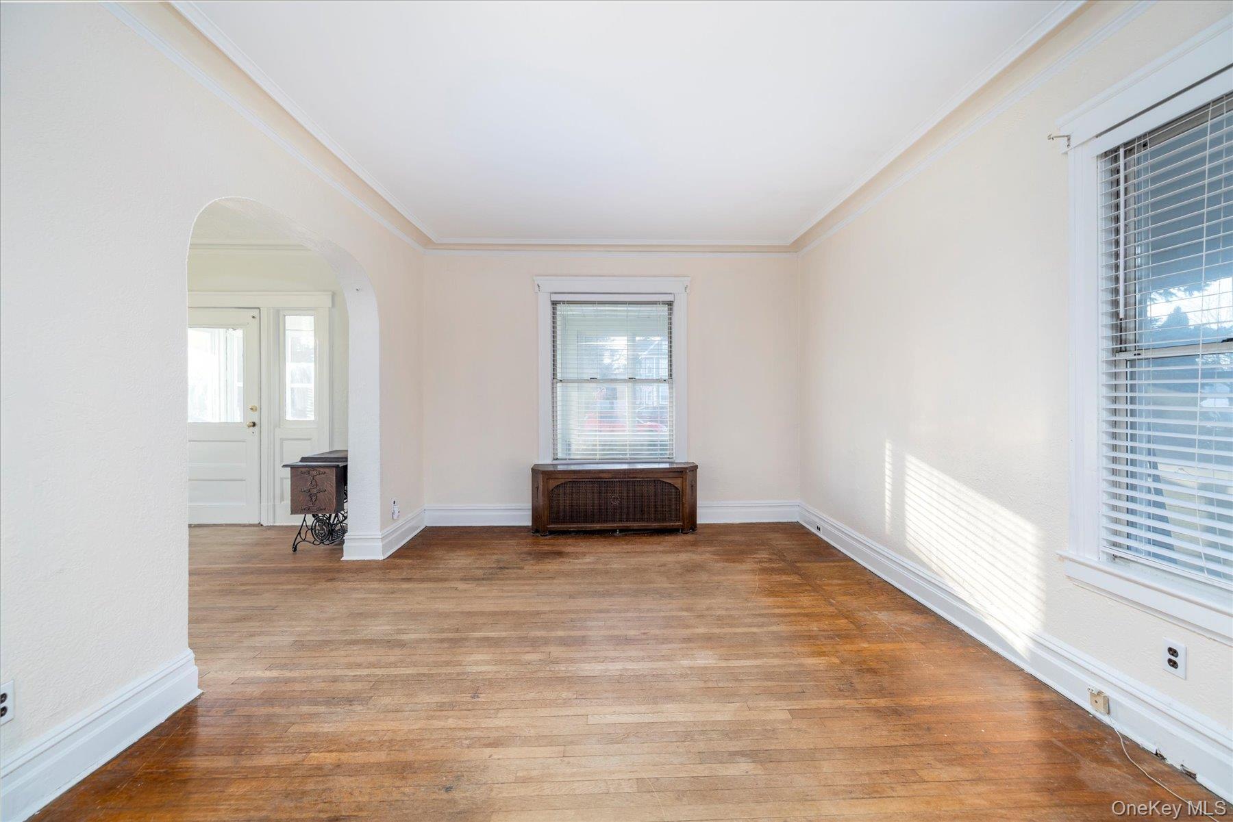 2483 Central Avenue Baldwin, NY 11510 - Photo 10 of 28 a view of an empty room and window