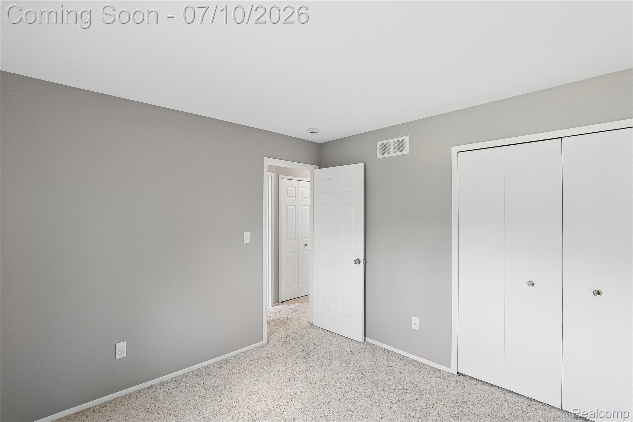 42698 Keystone Canton, MI 48187 - Photo 15 of 33 Interior room featuring neutral gray walls and light-colored carpet flooring