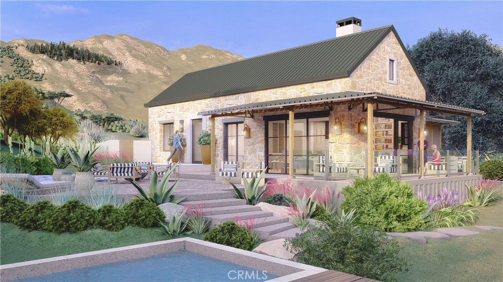 27152 Carrita Road Malibu, CA 90265 - Photo 6 of 9 a front view of a house with garden