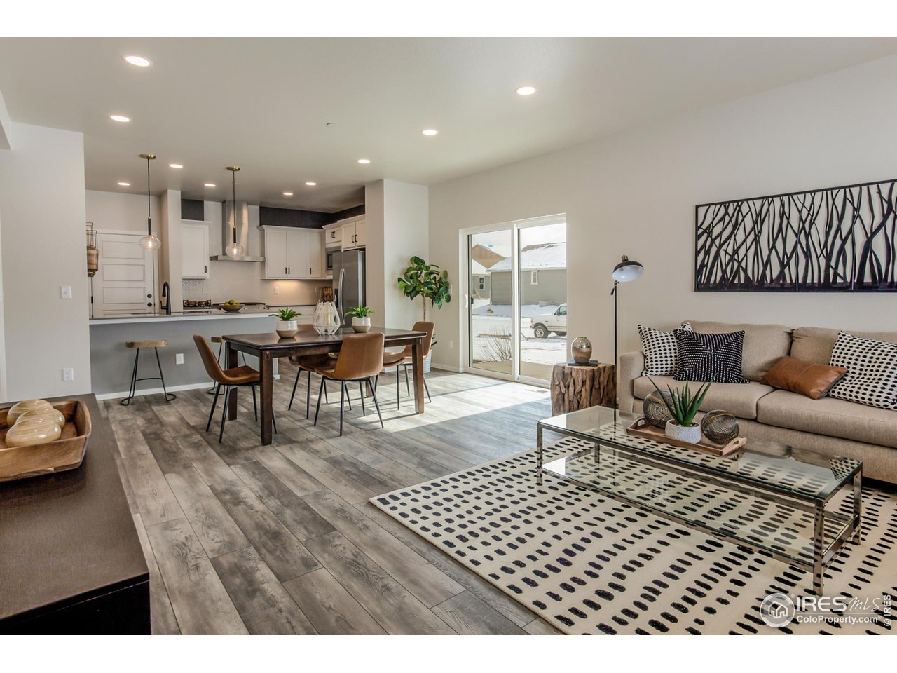 6613 4th St Road, Unit 6 Greeley, CO 80634 - Photo 8 of 35 EXAMPLE PHOTO: LIVING ROOM, DINING ROOM AND KITCHEN