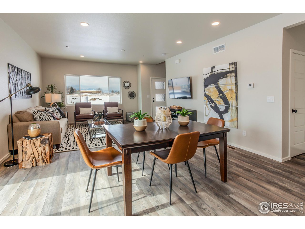 6613 4th St Road, Unit 6 Greeley, CO 80634 - Photo 9 of 35 EXAMPLE PHOTO: DINING ROOM AND LIVING ROOM