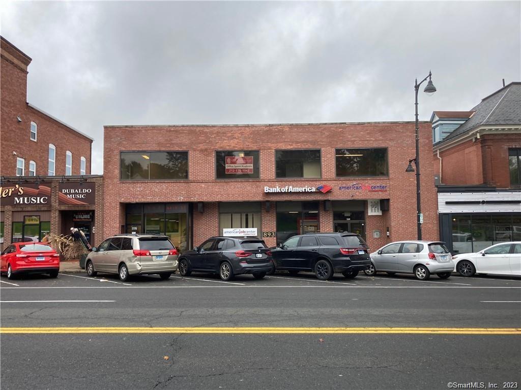 893 Main Street, Unit 202 Manchester, CT 06040 - Photo 10 of 10 a view of a cars parked in front of a building