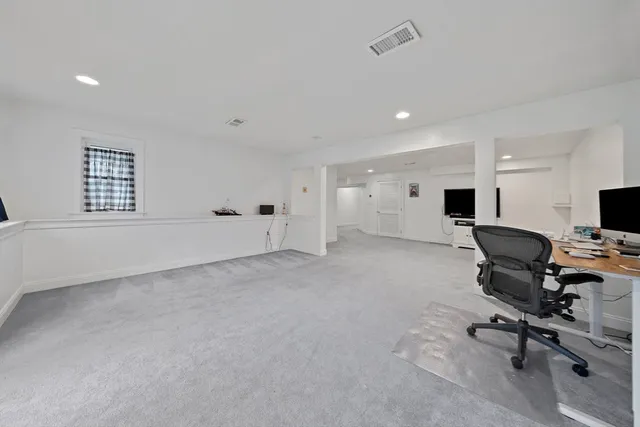 a view of workspace with livingroom