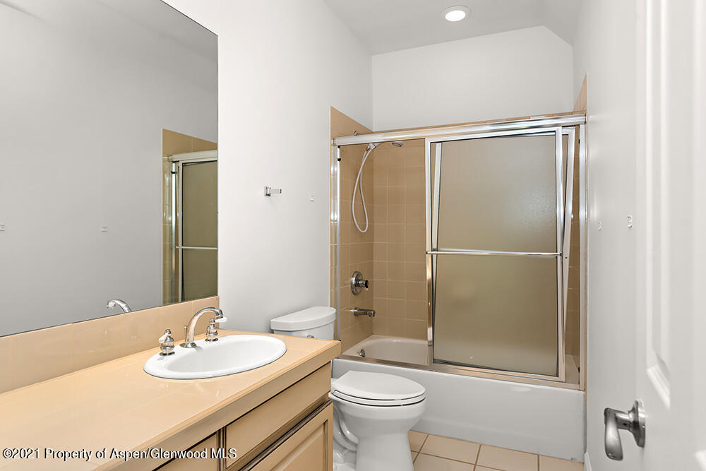 400 Medicine Bow Road Aspen, CO 81611 - Photo 28 of 58 a bathroom with a sink toilet and shower