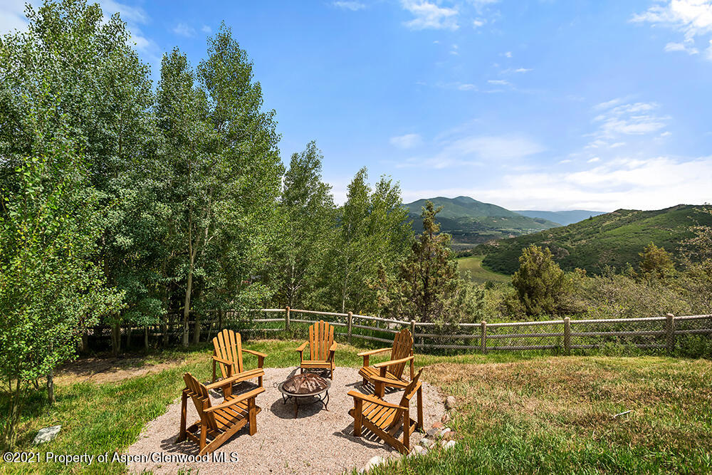 400 Medicine Bow Road Aspen, CO 81611 - Photo 49 of 58 a view of a swimming pool with a patio