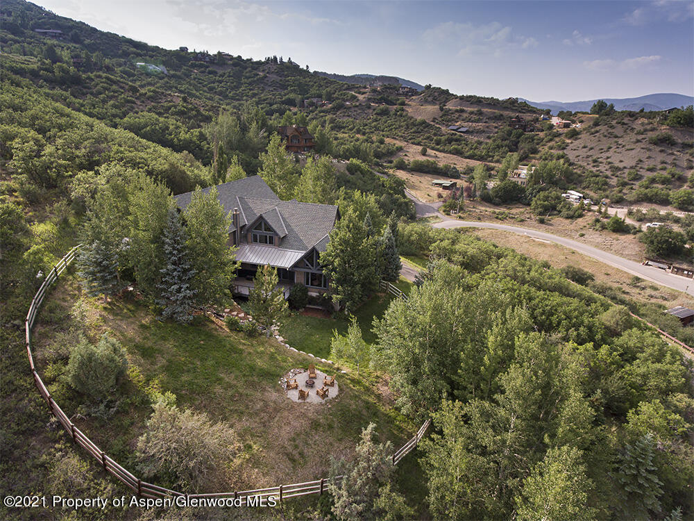 400 Medicine Bow Road Aspen, CO 81611 - Photo 55 of 58 an aerial view of residential houses with outdoor space and trees
