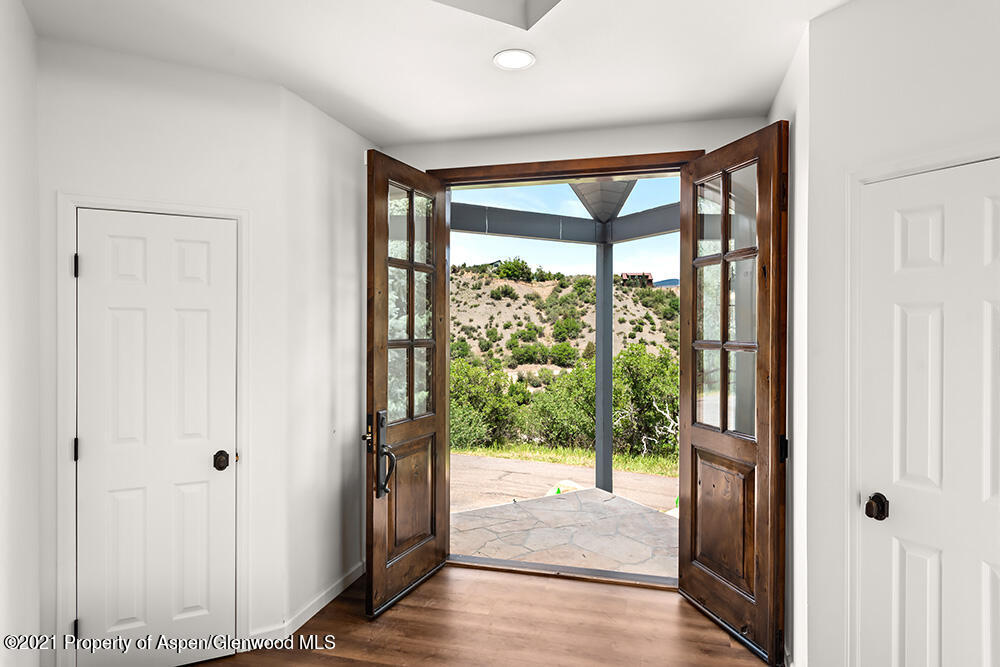 400 Medicine Bow Road Aspen, CO 81611 - Photo 6 of 58 a view of front door and porch