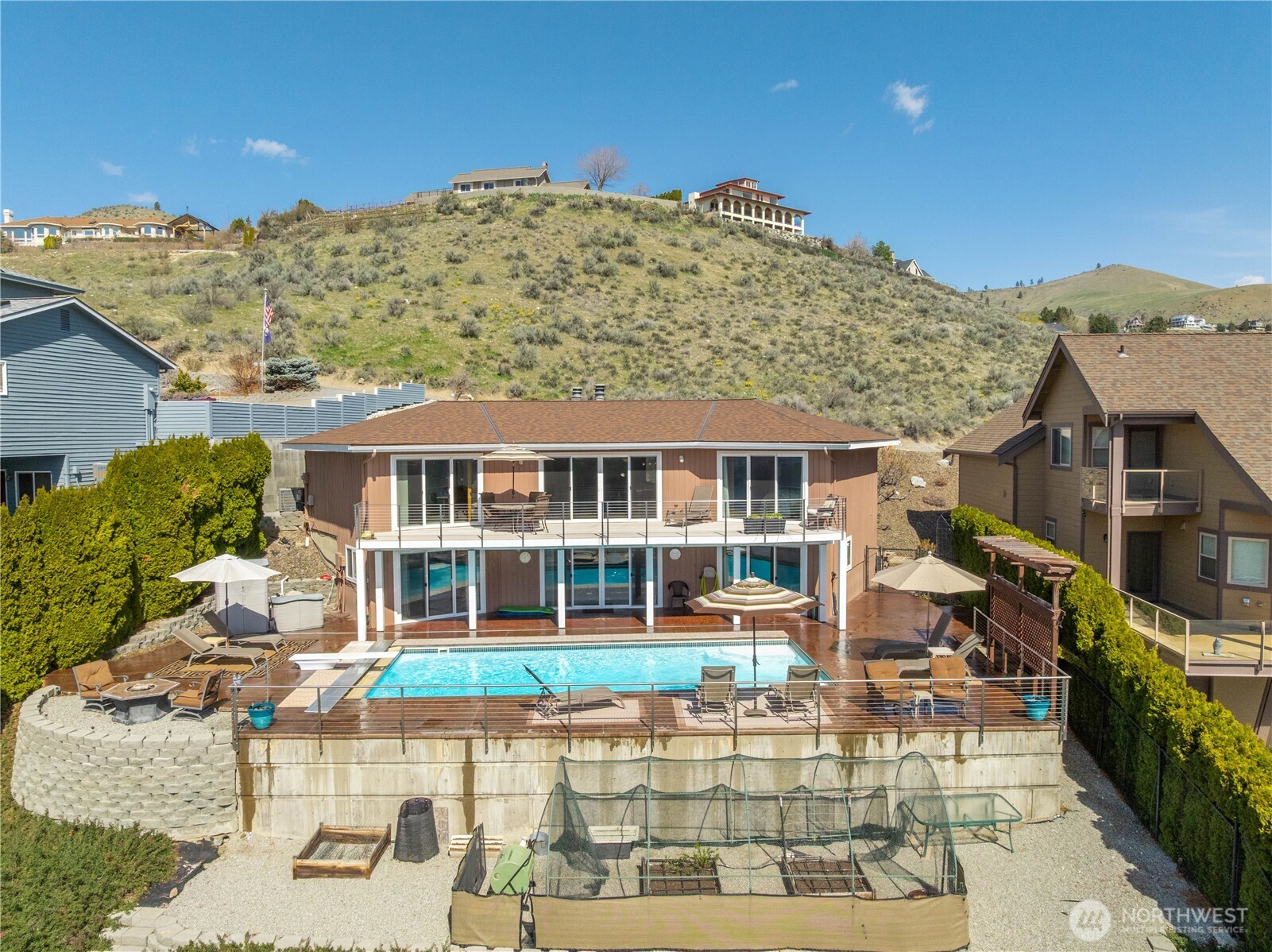 217 Riviera Drive Chelan, WA 98816 - Photo 27 of 38 a front view of a house with a yard