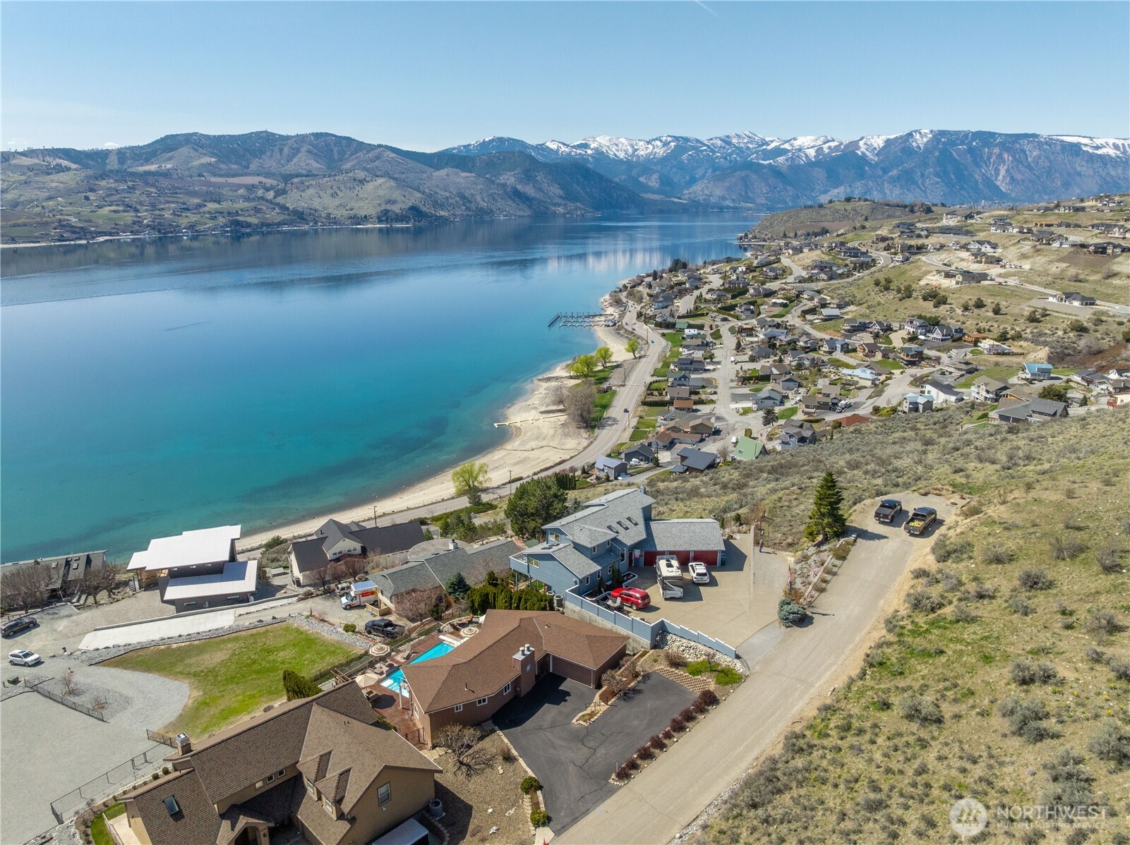 217 Riviera Drive Chelan, WA 98816 - Photo 28 of 38 a view of a lake with a mountain
