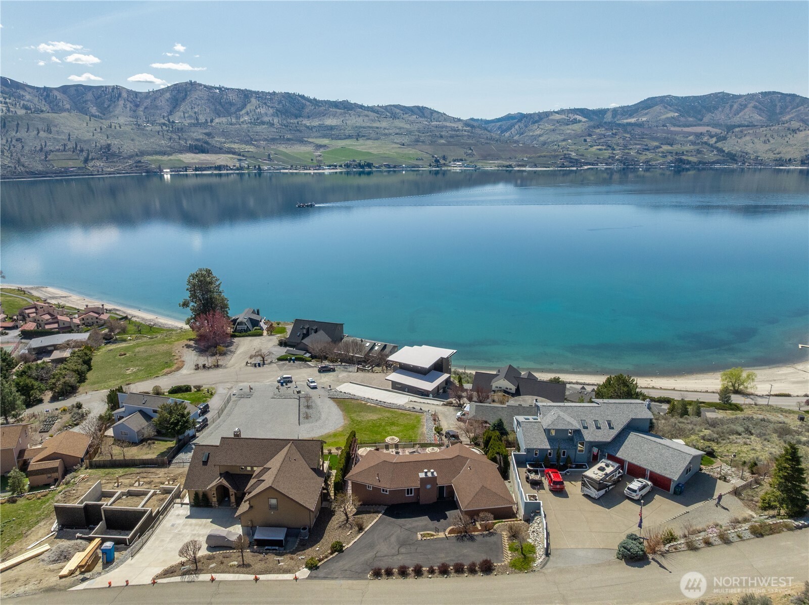 217 Riviera Drive Chelan, WA 98816 - Photo 29 of 38 a view of a lake with a mountain