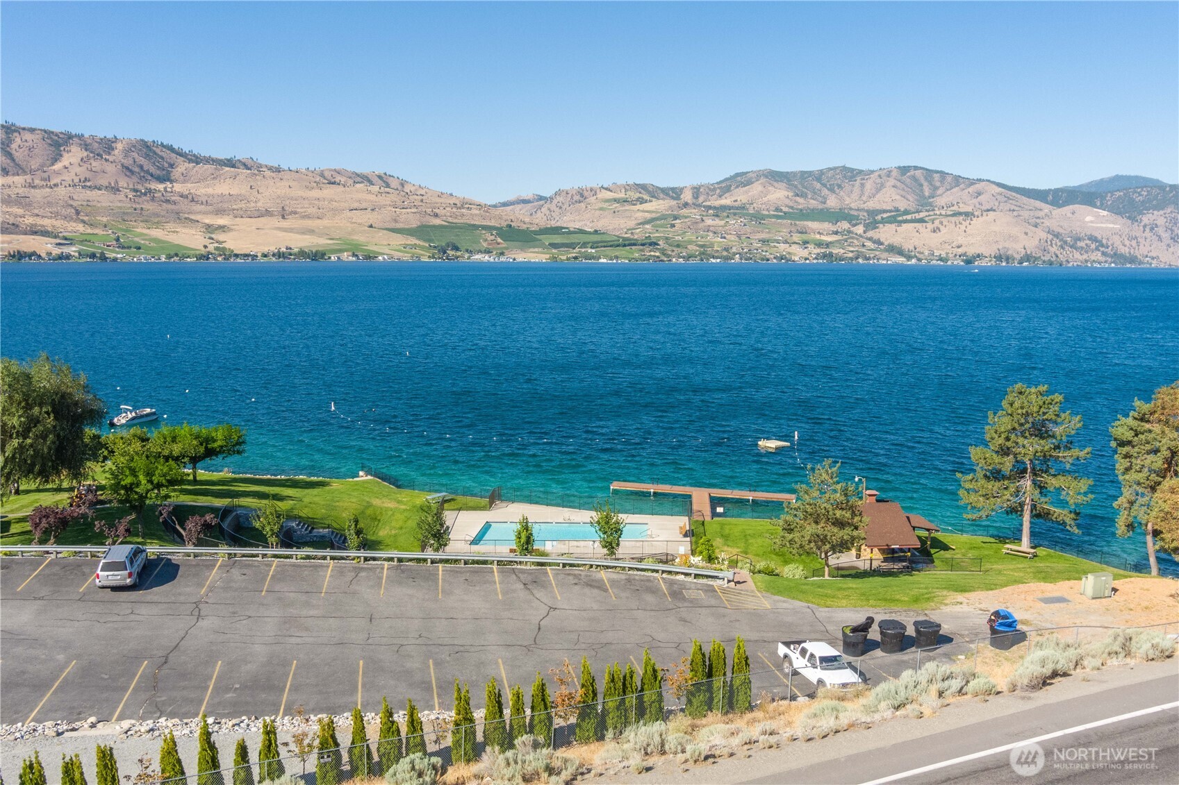 217 Riviera Drive Chelan, WA 98816 - Photo 31 of 38 a view of a garden with an ocean