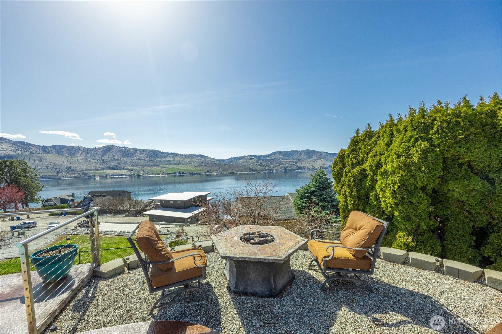 217 Riviera Drive Chelan, WA 98816 - Photo 4 of 38 a view of a lake with outdoor seating space