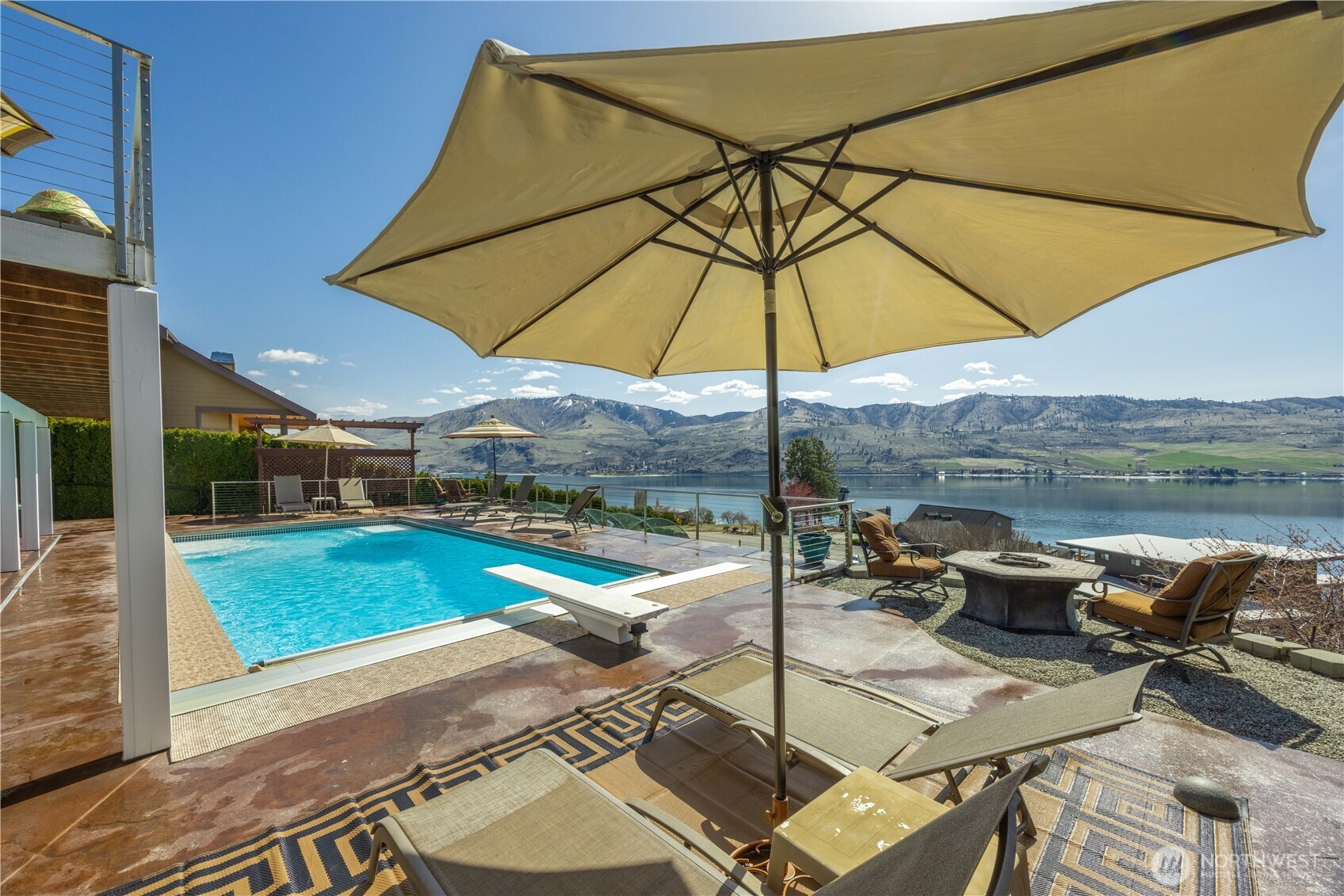 217 Riviera Drive Chelan, WA 98816 - Photo 5 of 38 a view of a backyard with sitting area