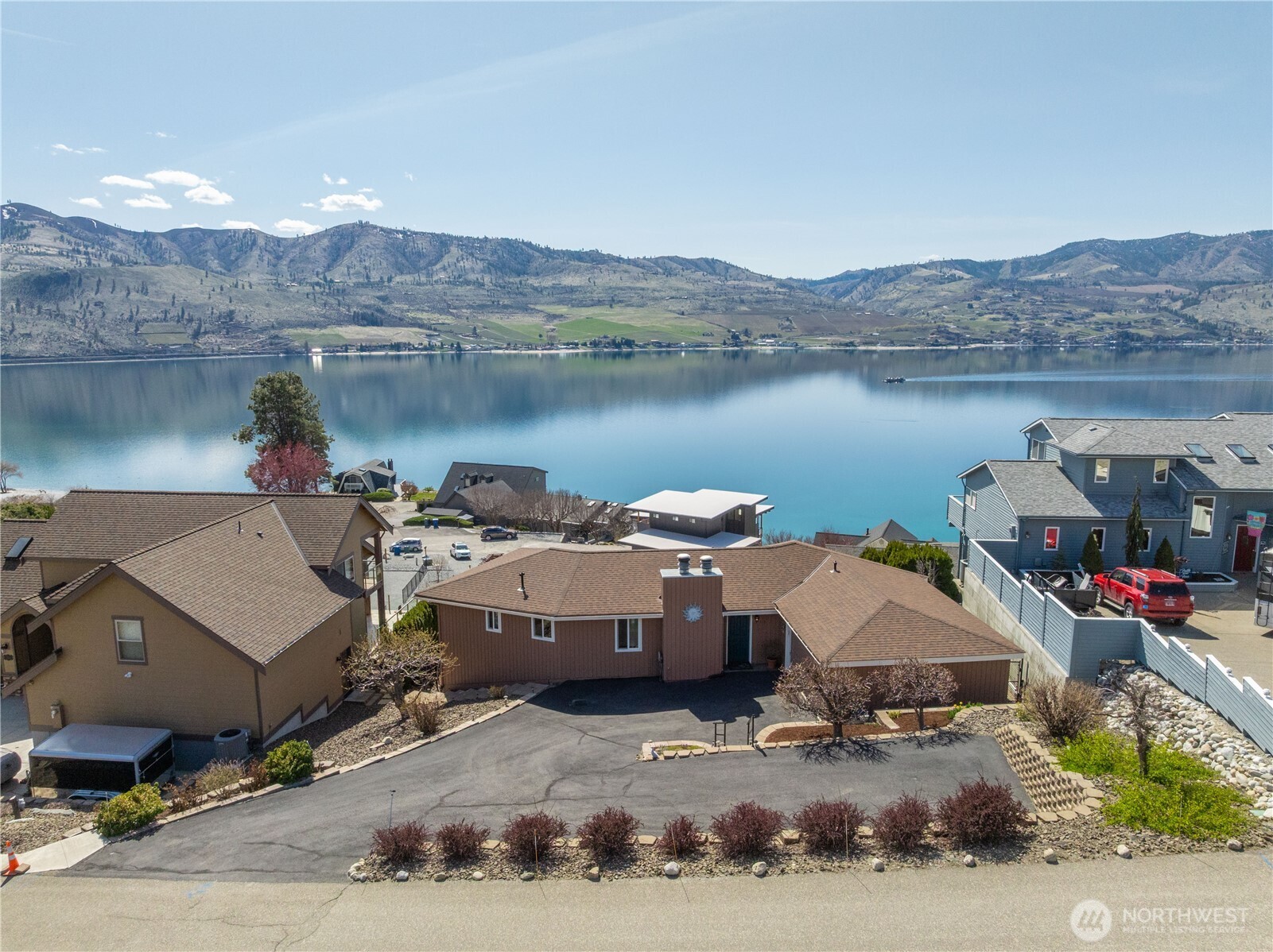 217 Riviera Drive Chelan, WA 98816 - Photo 7 of 38 a terrace of a house with outdoor seating