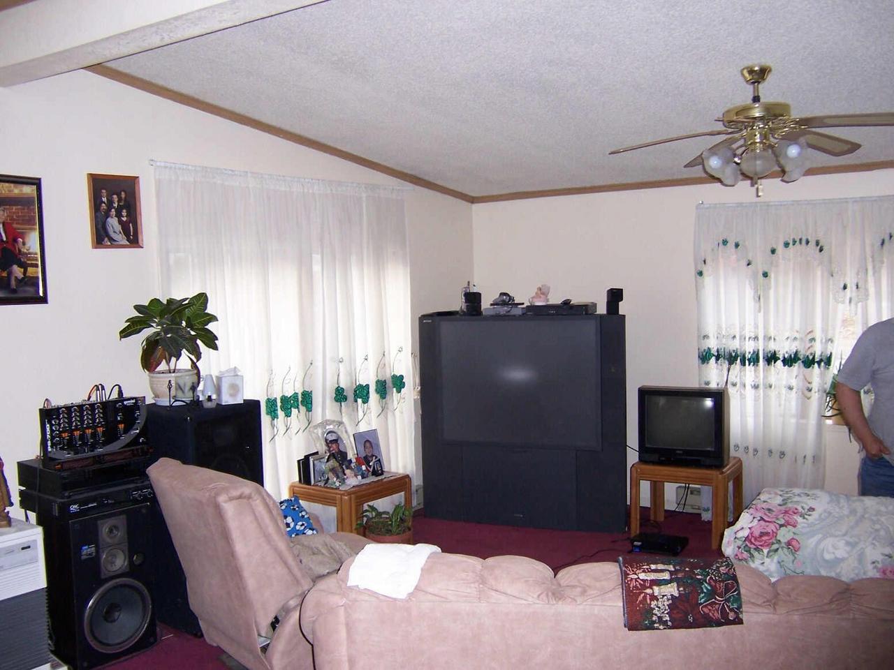 1627 David Road Effort, PA 18330 - Photo 3 of 3 a living room with furniture and a flat screen tv